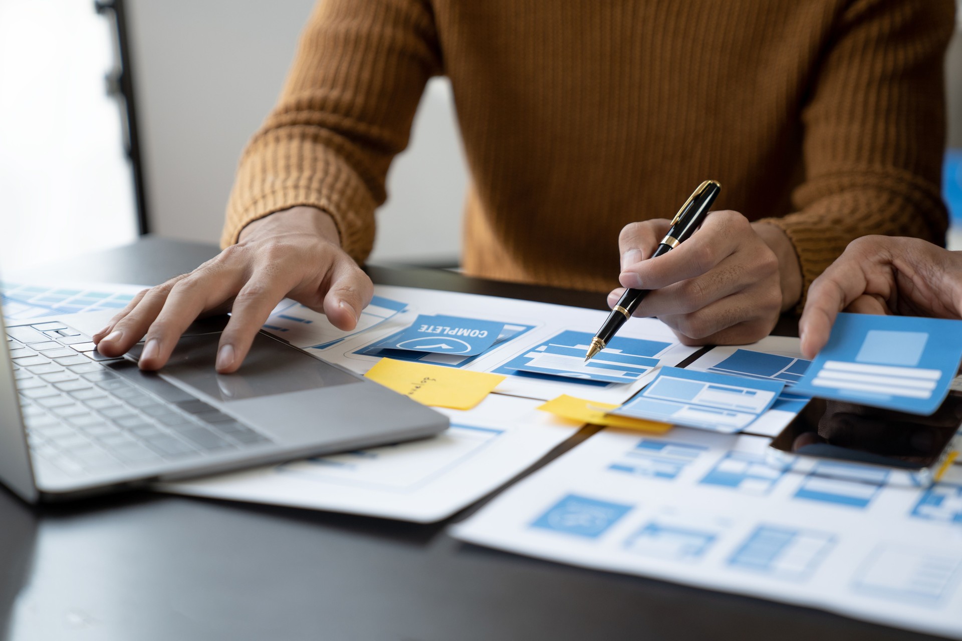 woman in brown long sleeve shirt reading book
